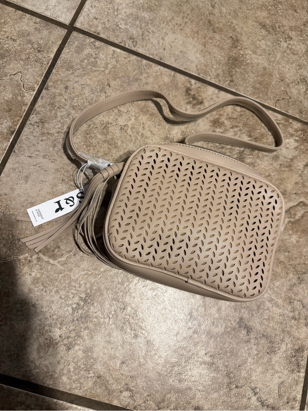NWT S & R Perforated Taupe Crossbody Bag with Tassel Accent